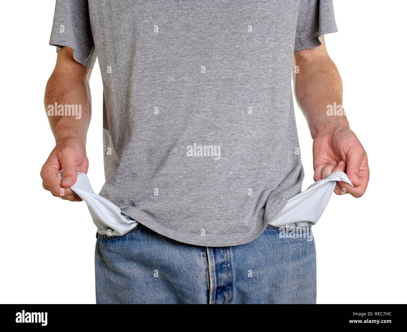 Hombre con los bolsillos vacíos en tiempos económicos difíciles, conceptual  shot Fotografía de stock - Alamy