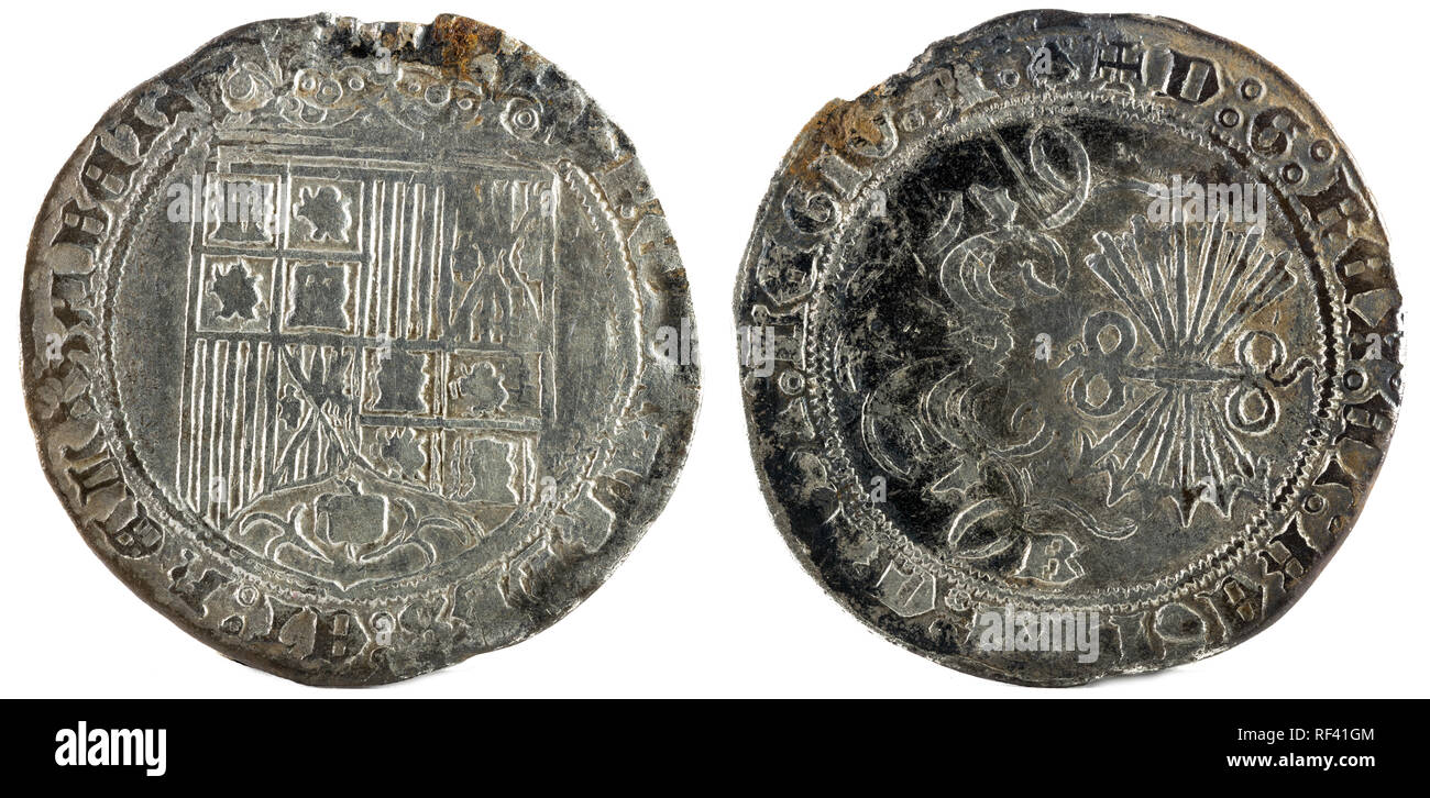 Antigua moneda de plata española de los reyes Fernando e Isabel. Reyes Católicos. Acuñado en Burgos. Real. Foto de stock