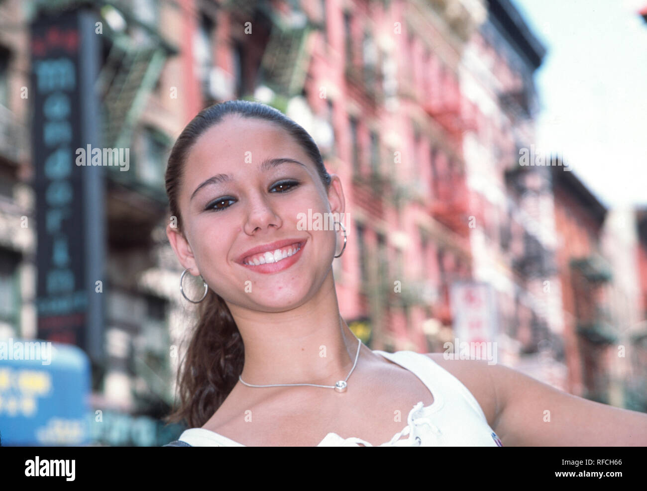 Niña de 16 años Turista en Chinatown, NUEVA YORK, EE.UU. Foto de stock