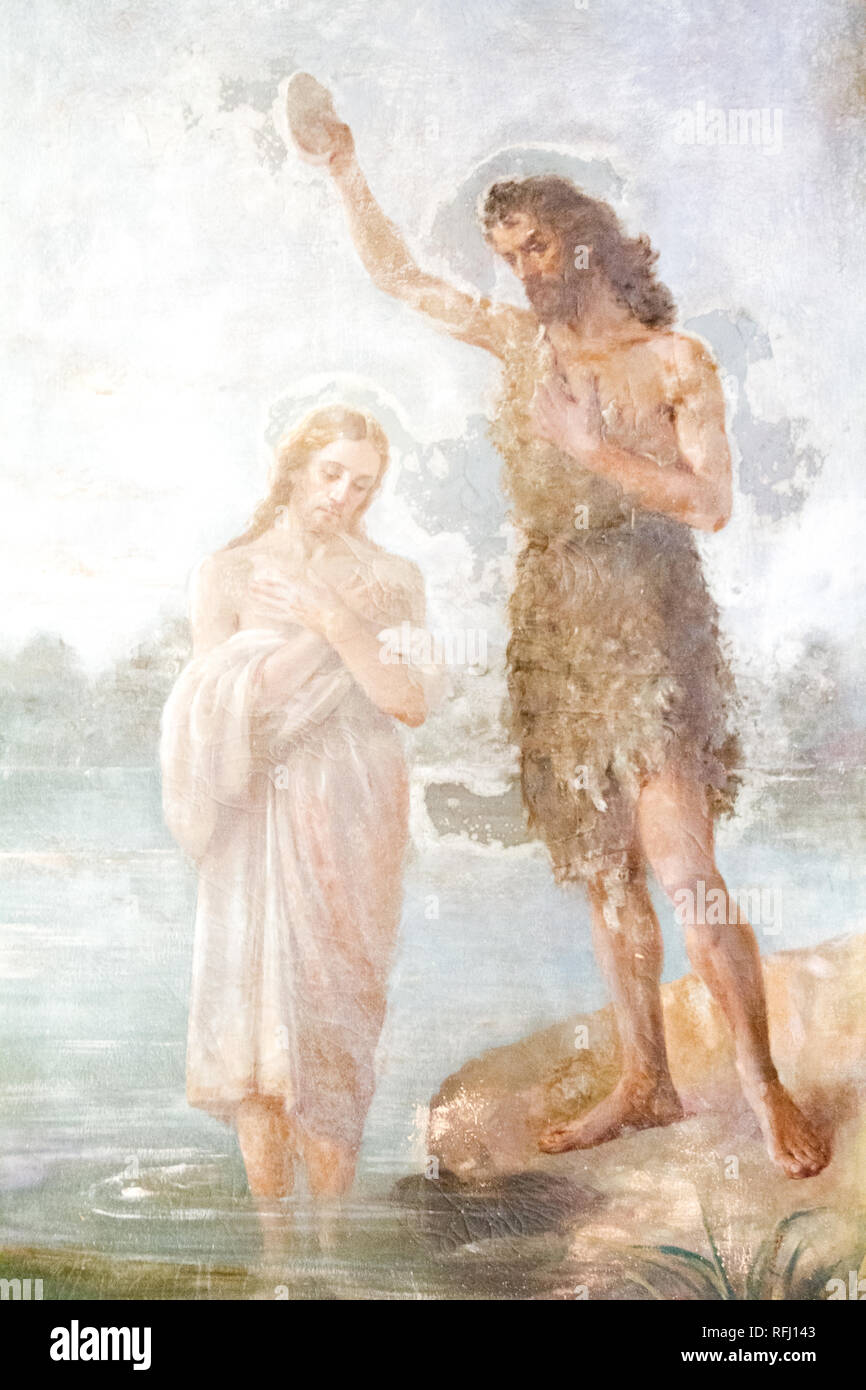 Fresco del bautismo de Jesús por San Juan Bautista en una iglesia en Pavia, Italia. Foto de stock