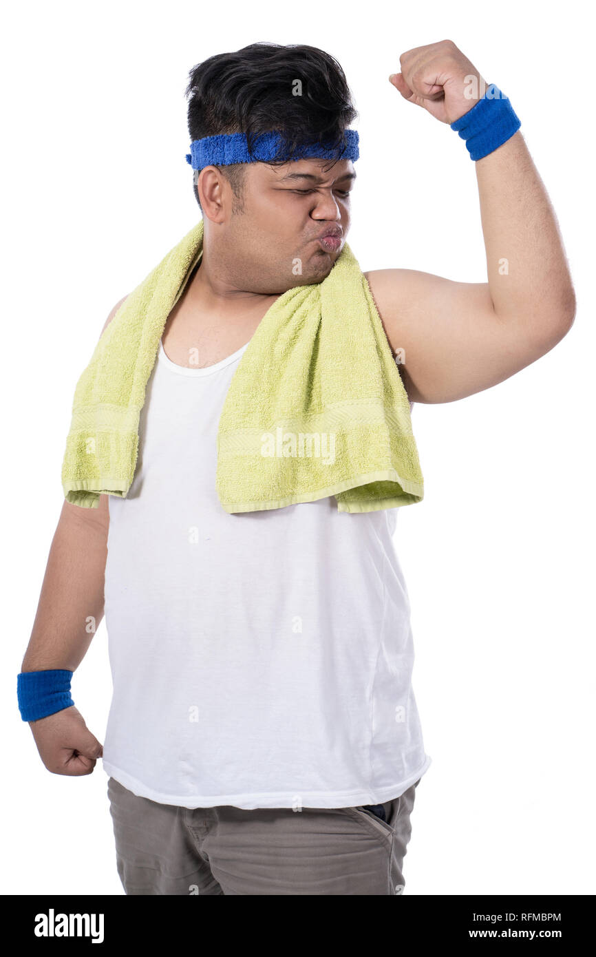 Potrait de grasa joven con kiss plantean para bíceps con una toalla  Fotografía de stock - Alamy