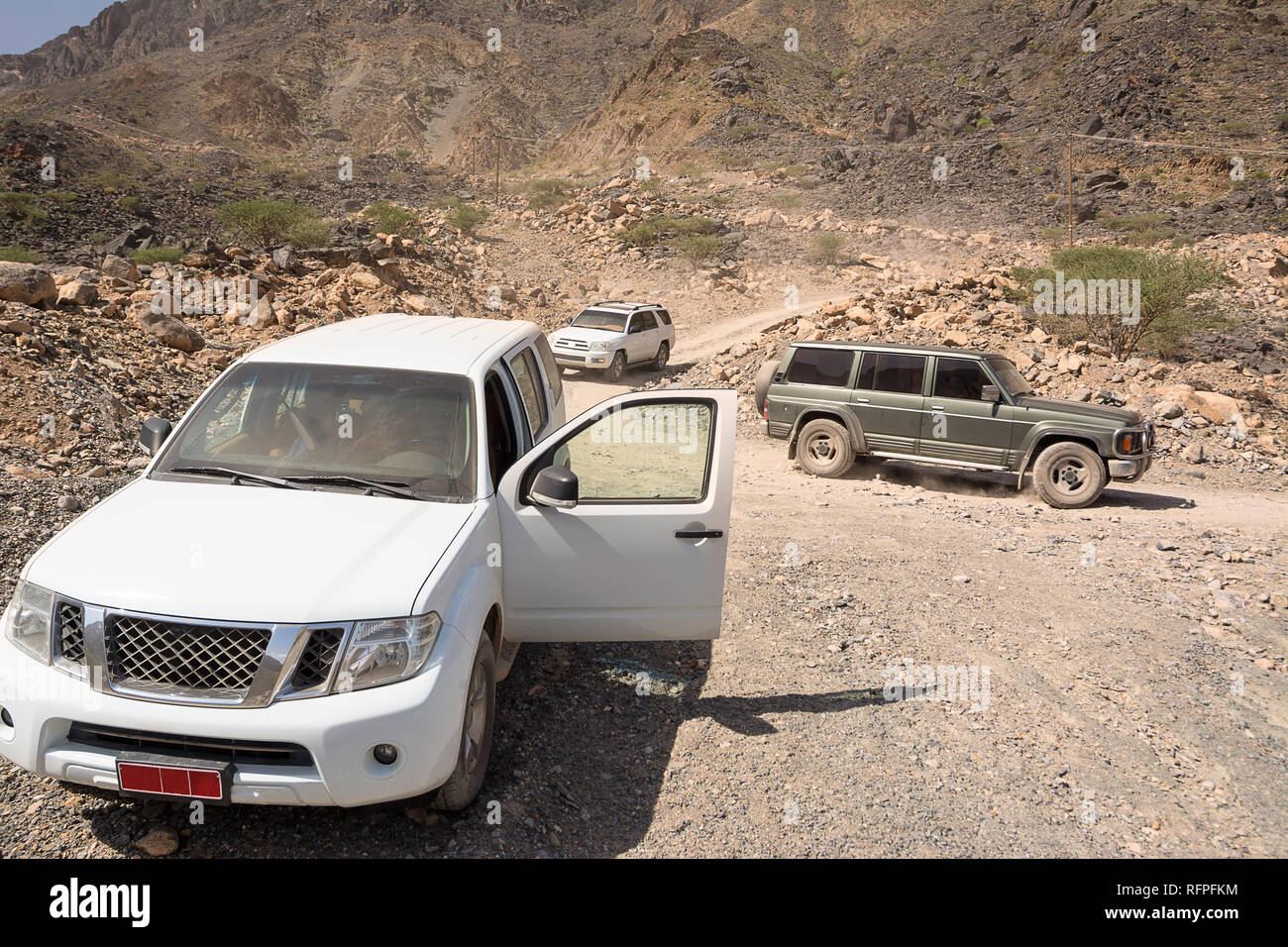 Vehículos todoterreno en las montañas de Jebel Shams (Omán) Foto de stock