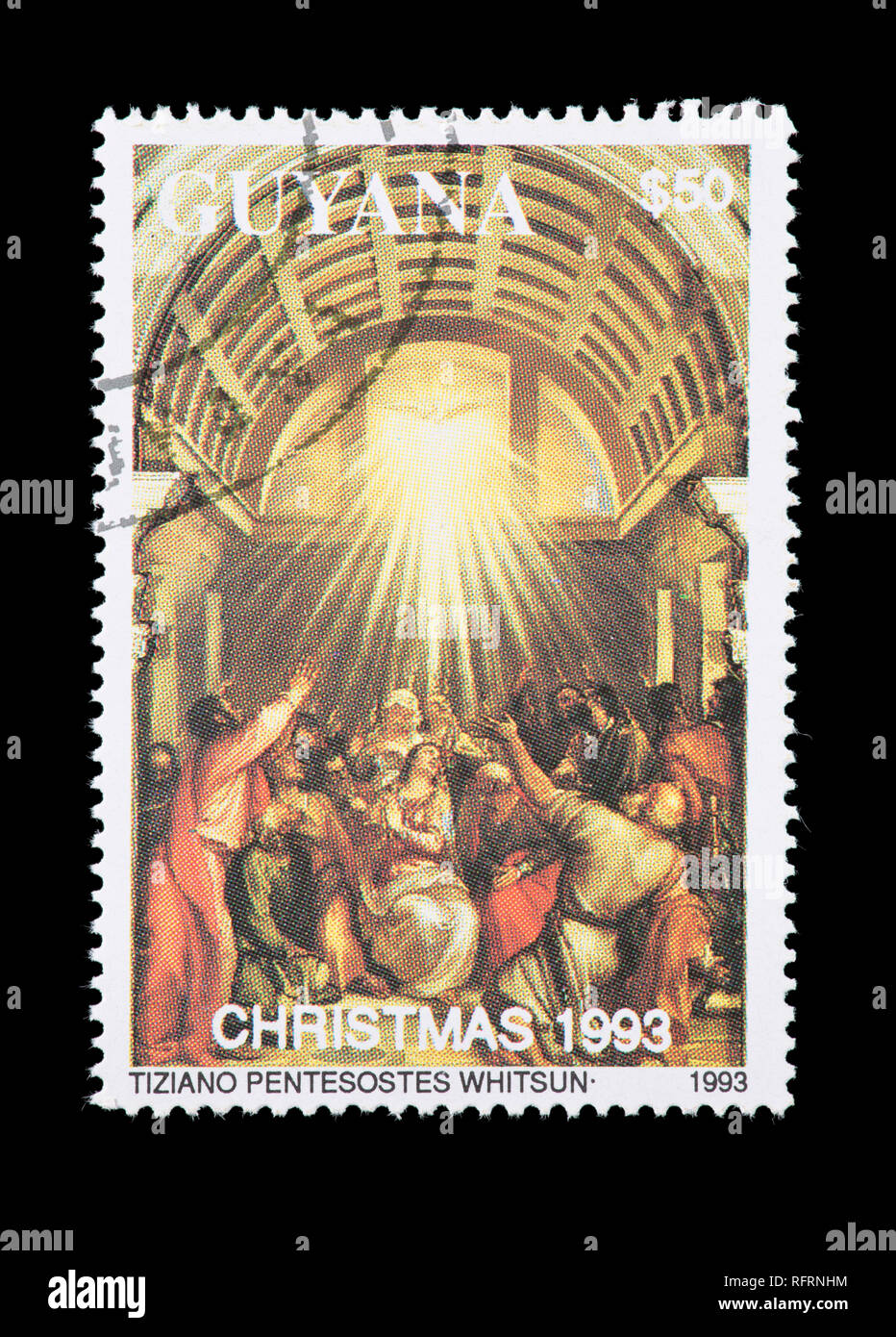 Sello de Guyana representando la pintura Tiziano Pentecostés. Foto de stock