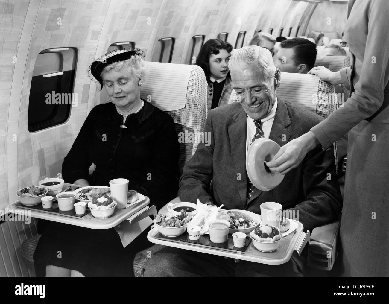 Pareja en avión, american airlines, 1964 Foto de stock
