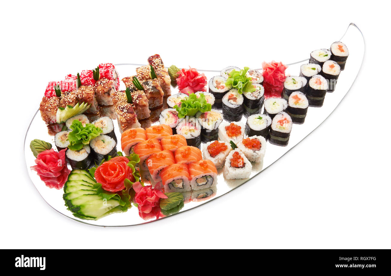 Sushi set . Los diferentes tipos de sushi en el espejo aislado en blanco Foto de stock