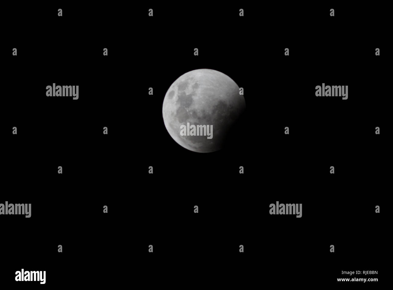 La transición del eclipse lunar del 21 de enero de Foto de stock