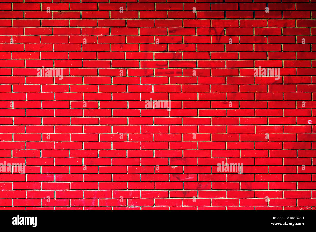 Grunge muro de ladrillo rojo de fondo, construcción de fachada exterior Foto de stock