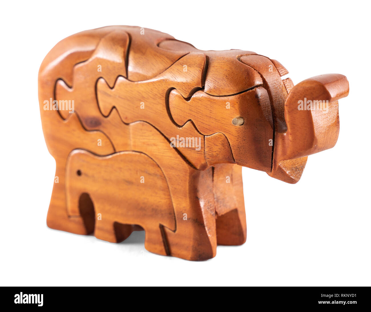 Rompecabezas de elefantes de madera sobre pantalla blanca aislada Fotografía de stock