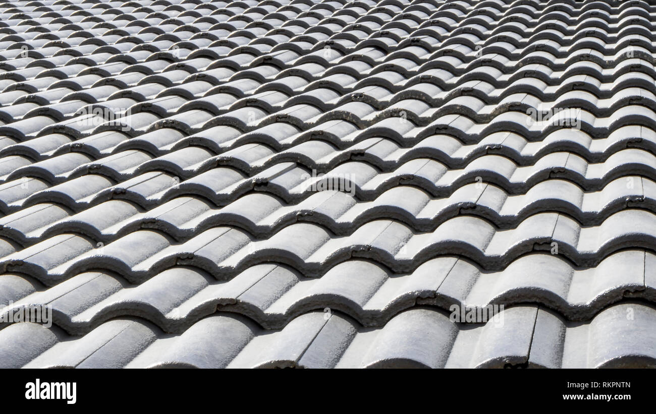 Las tejas del techo y la textura de fondo. La construcción del techo de