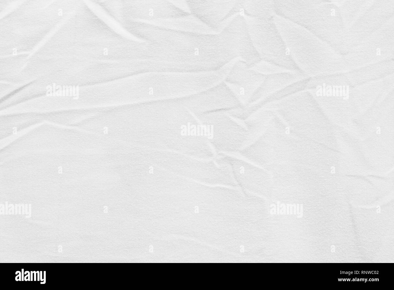 Tejido de algodón blanco de lienzo arrugada textura del fondo para el diseño de fondo o superposición blackdrop Foto de stock
