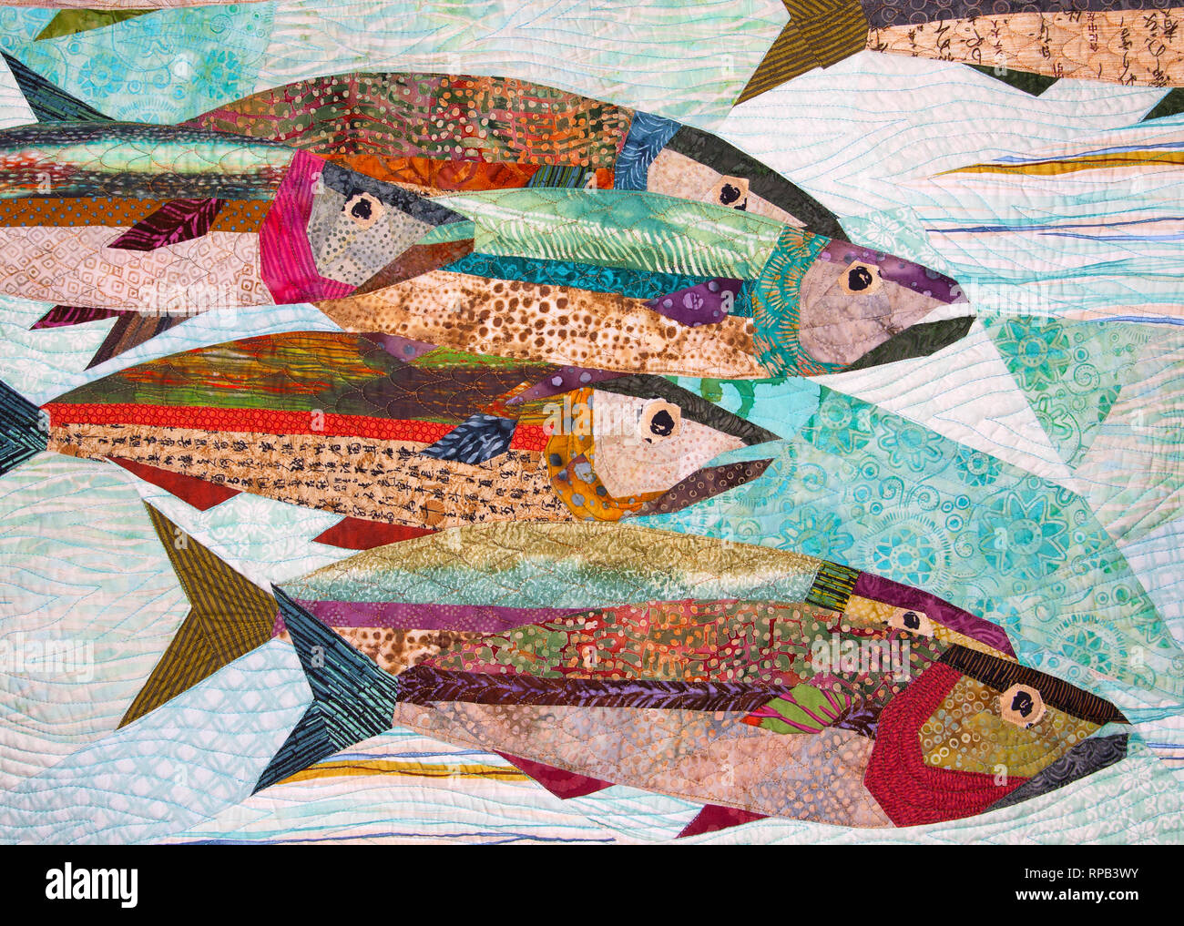 Colcha artesanal con peces como un tapiz Foto de stock