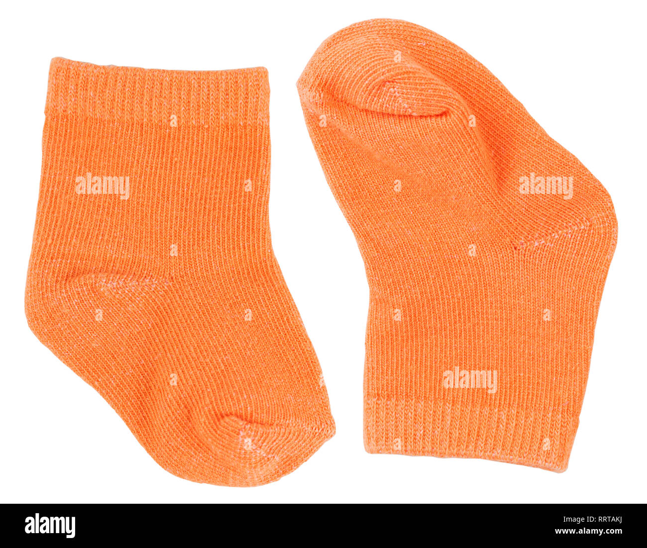 Calcetines bebé naranja aislado en blanco Foto de stock