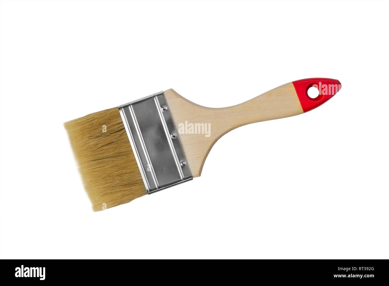 El cepillo de la pintura con un mango de madera sobre un fondo blanco aislado Foto de stock