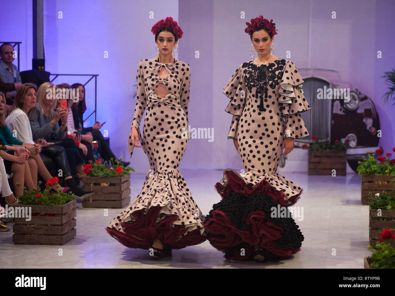 Málaga, España. 3 Mar, 2019. Los modelos están vistiendo trajes de flamenca, ya que plantean para los fotógrafos en la pasarela la IV Feria de la Moda en