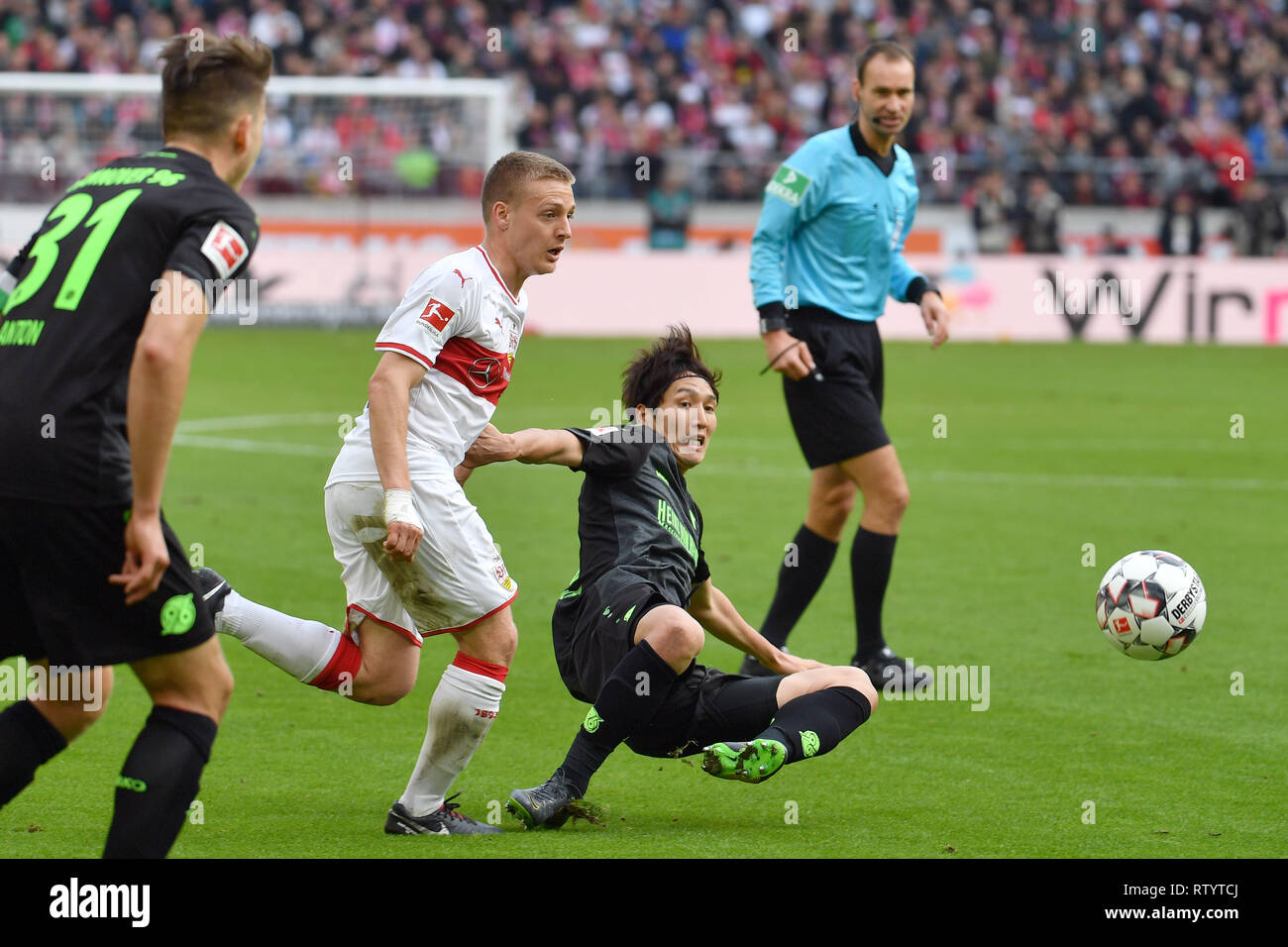 Stuttgart, Alemania. 03Rd Mar, 2019. Genki HARAGUCHI (Hannover 96), Acción, duelos versus Santiago ASCACIBAR (VFB Stuttgart) . Fútbol 1. Bundesliga, 24.jornada, jornada24, el VFB Stuttgart-Hanover 96 (H) 5-1, 03.03.2019 en Stuttgart/Alemania. MERCEDES BENZ ARENA. DFL reglamentos prohíben cualquier uso de la fotografía como secuencias de imágenes y/o cuasi-Vídeo. | Uso de crédito en todo el mundo: dpa/Alamy Live News Foto de stock