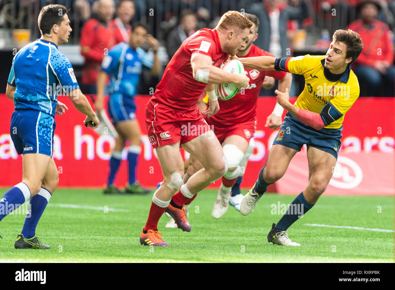 Vancouver, Canadá. El 10 de marzo, 2019. Daniel Barranco de España intentando detener Connor Braid de Canadá. 2019 HSBC Canadá Rugby Sevens - Día Dos, BC Place Stadium. © Gerry Rousseau/Alamy Live News Foto de stock