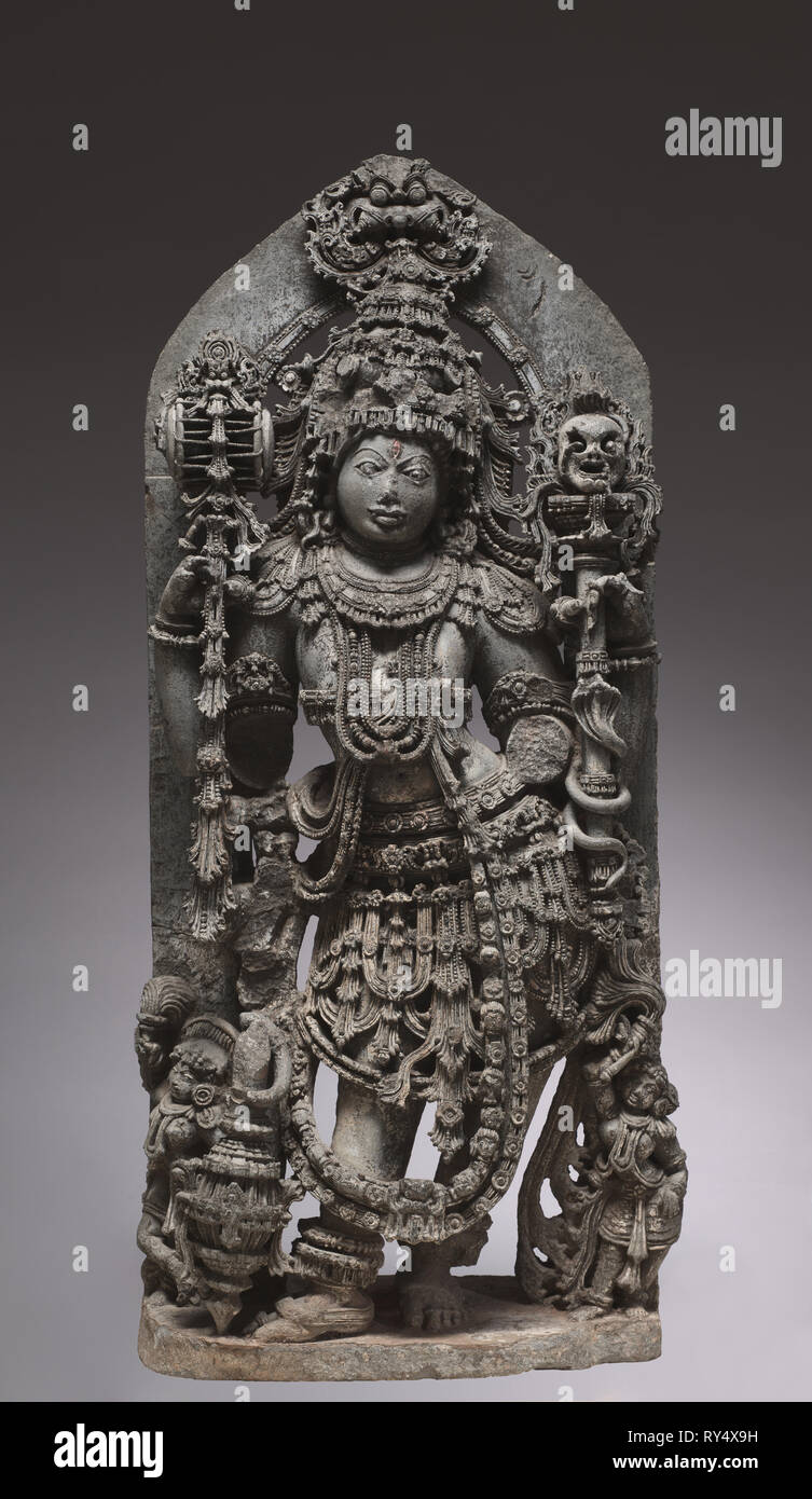 Un tutor de Shiva, 1200s. El suroeste de la India, Karnataka. Esquisto Chloritic; total: 113,3 x 49,2 x 29 cm (44 5/8 x 19 3/8 x 11 7/16 in. Foto de stock