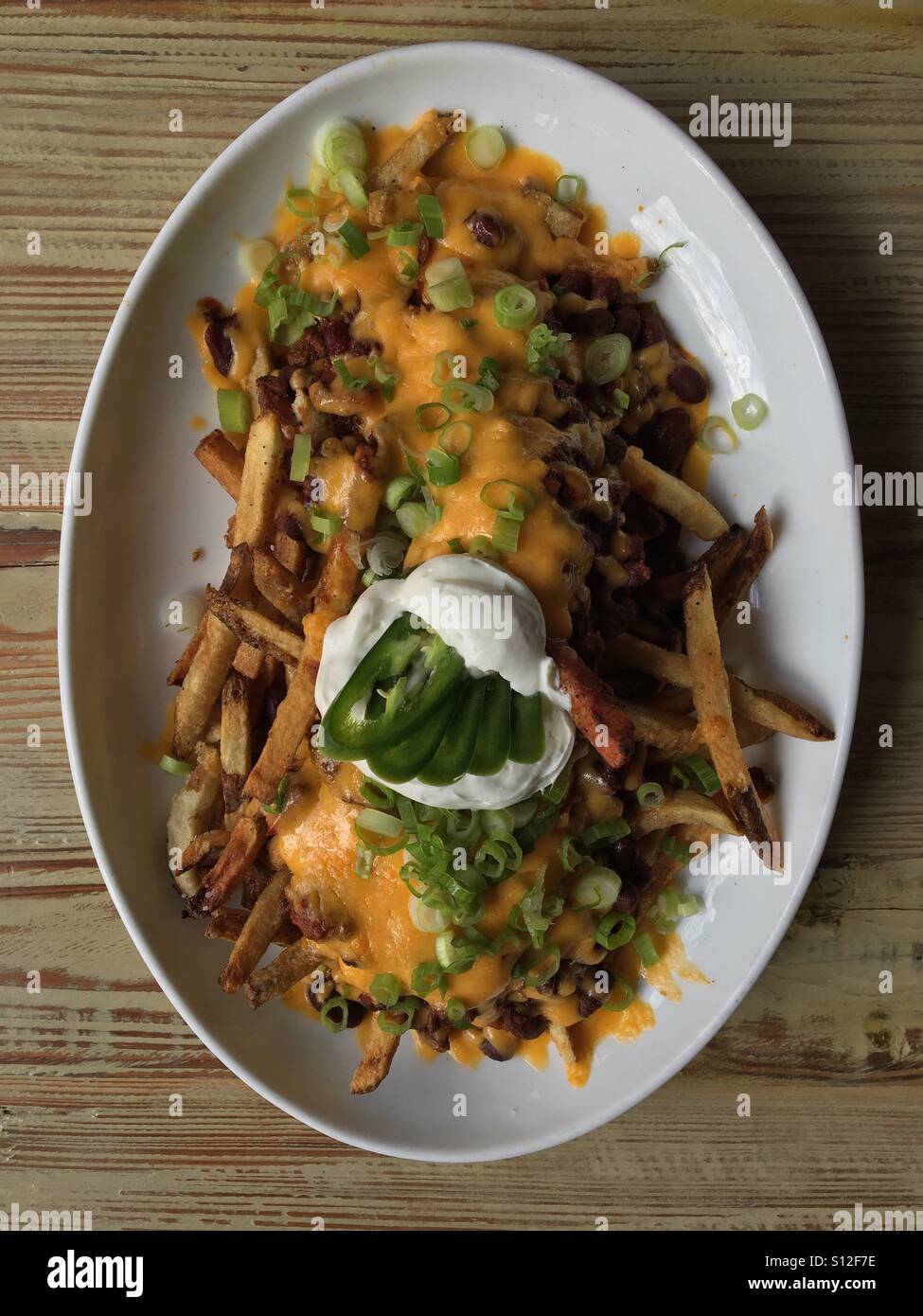 Chile con papas fritas fotografías e imágenes de alta resolución Alamy