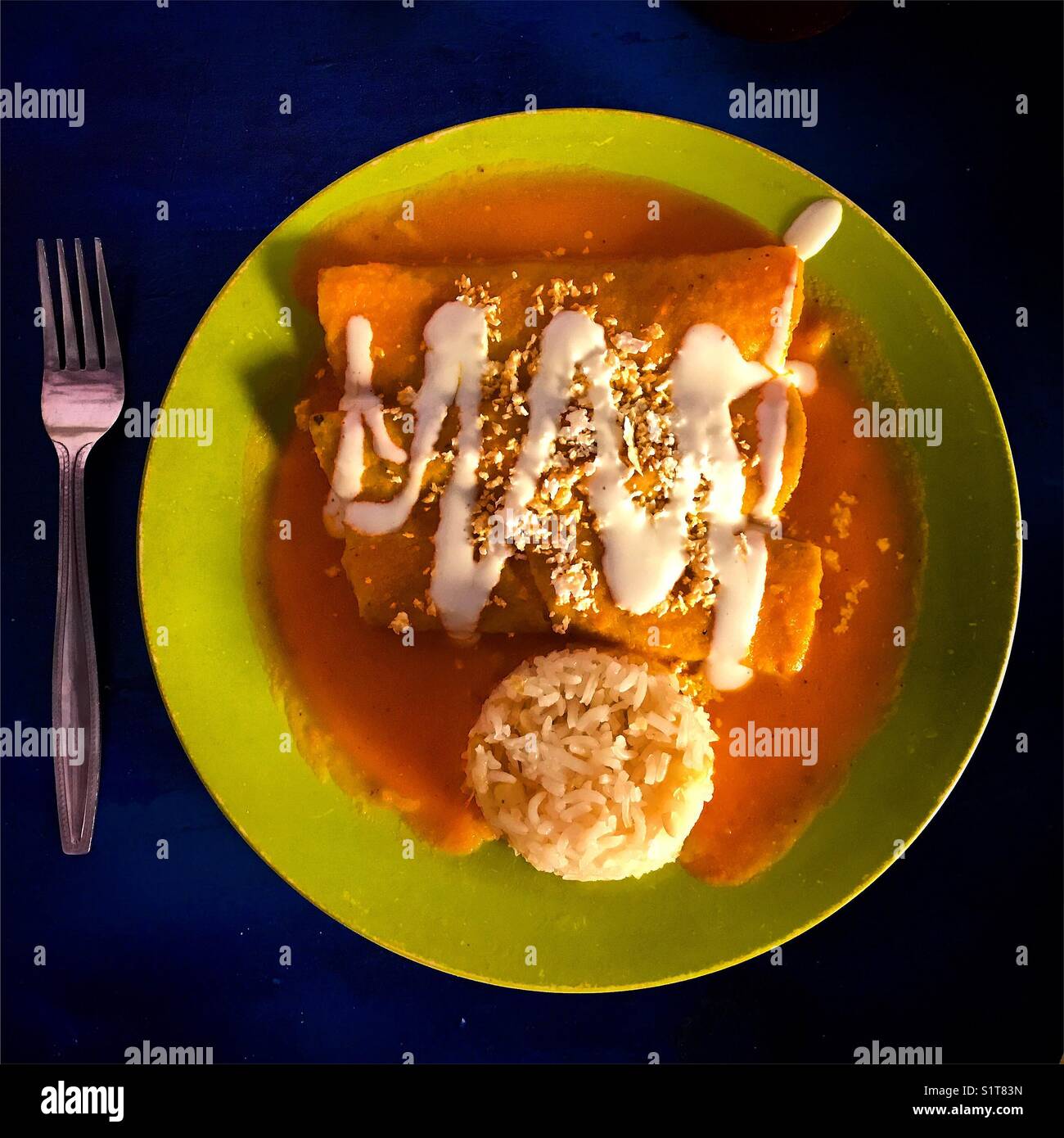 Enchiladas rojas Enchiladas (rojas) con arroz en la Casa de Ofelia restaurante en Guanajuato