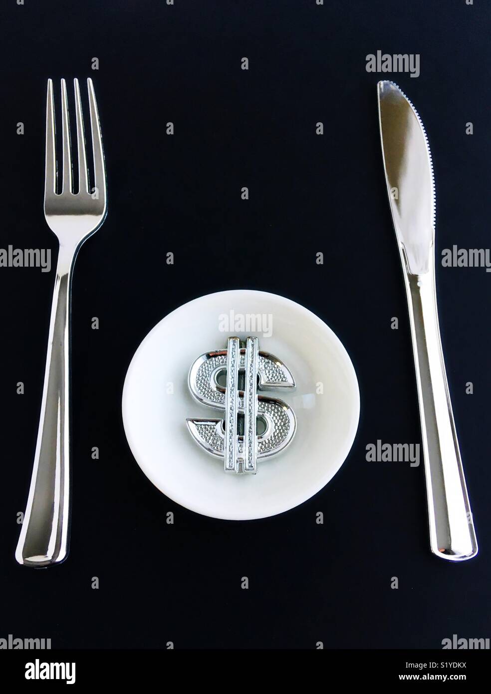 Conceptual: hambrientos de dinero. Foto de stock