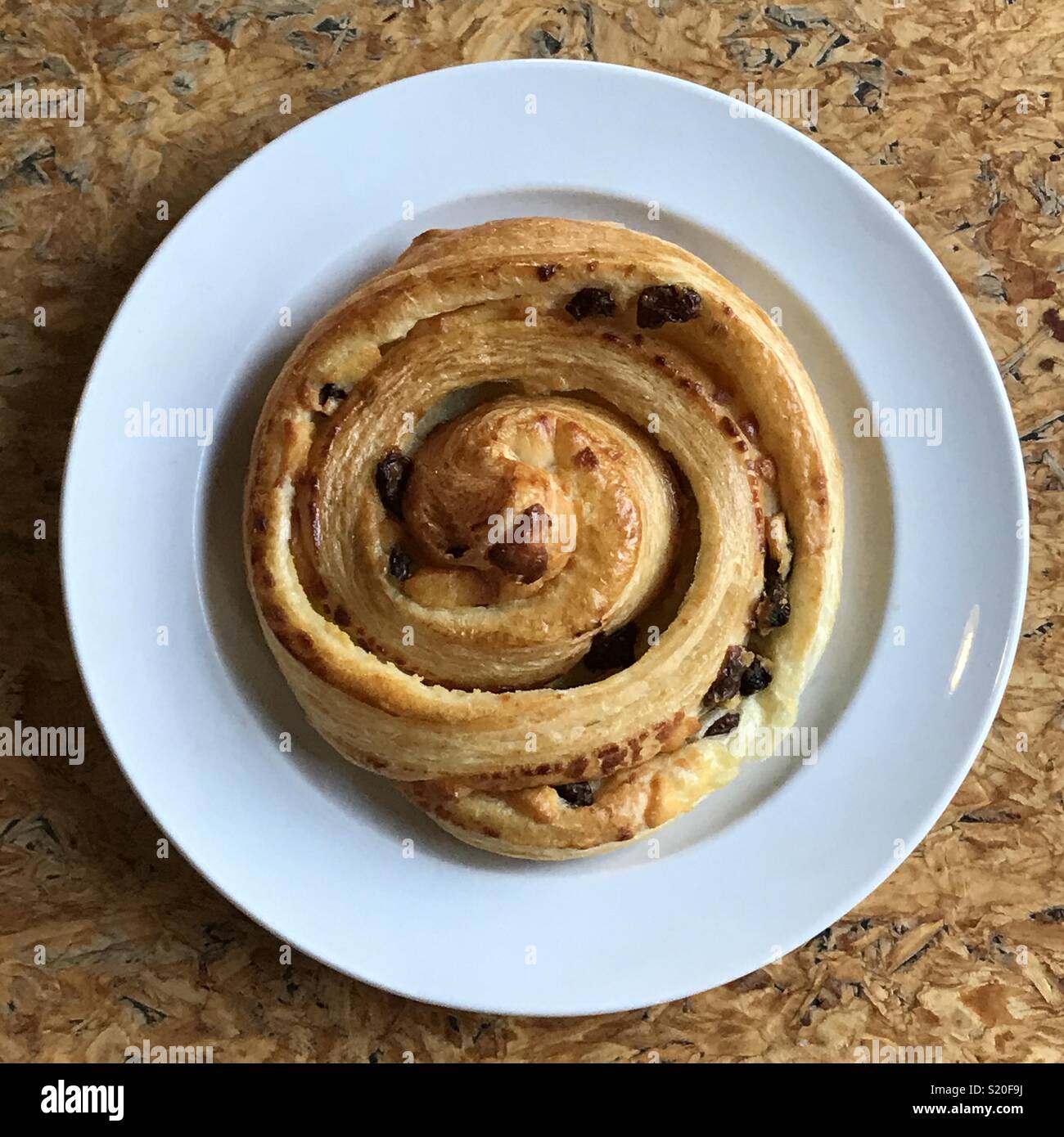 Un pain au Raisin pastelería Foto de stock