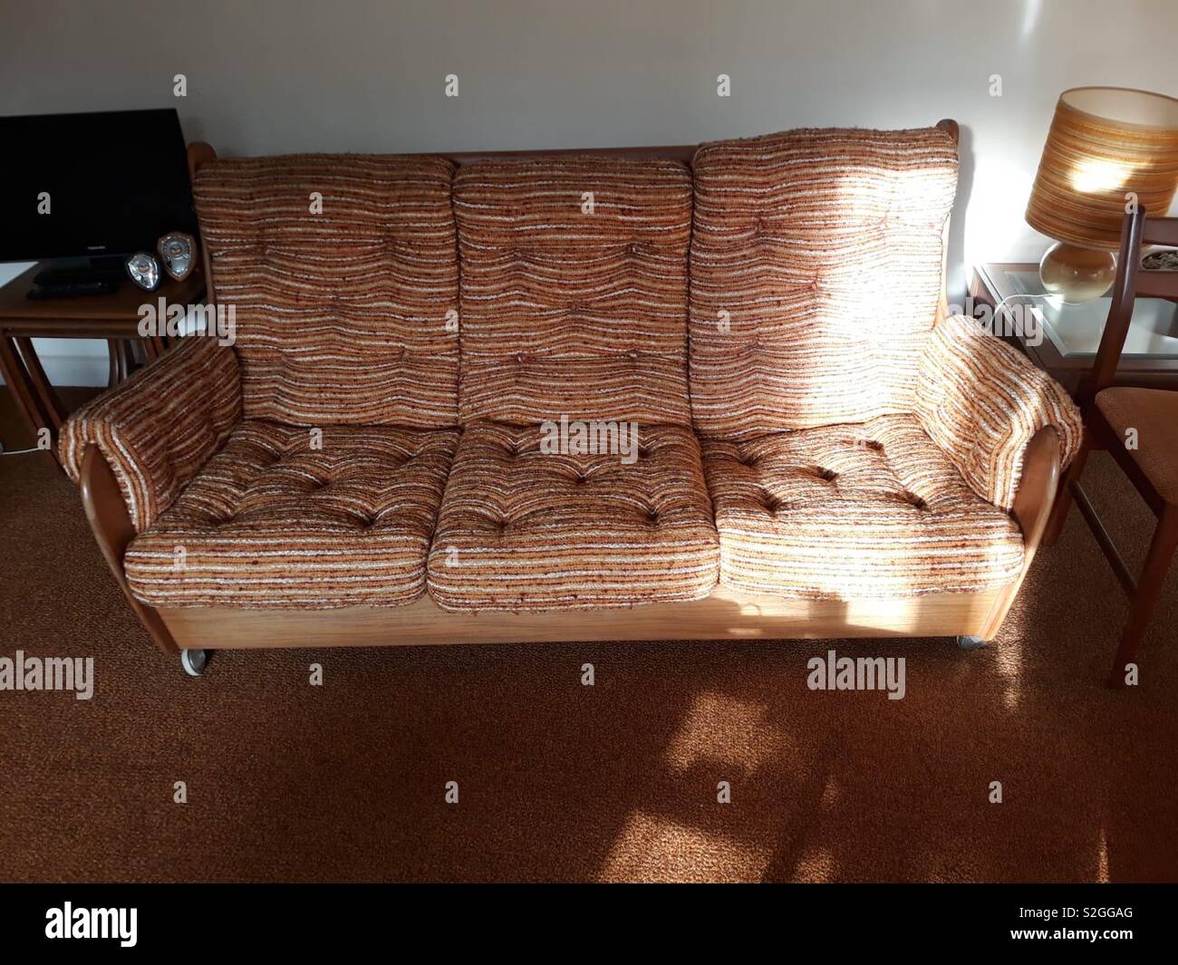 Triste sofá Foto de stock