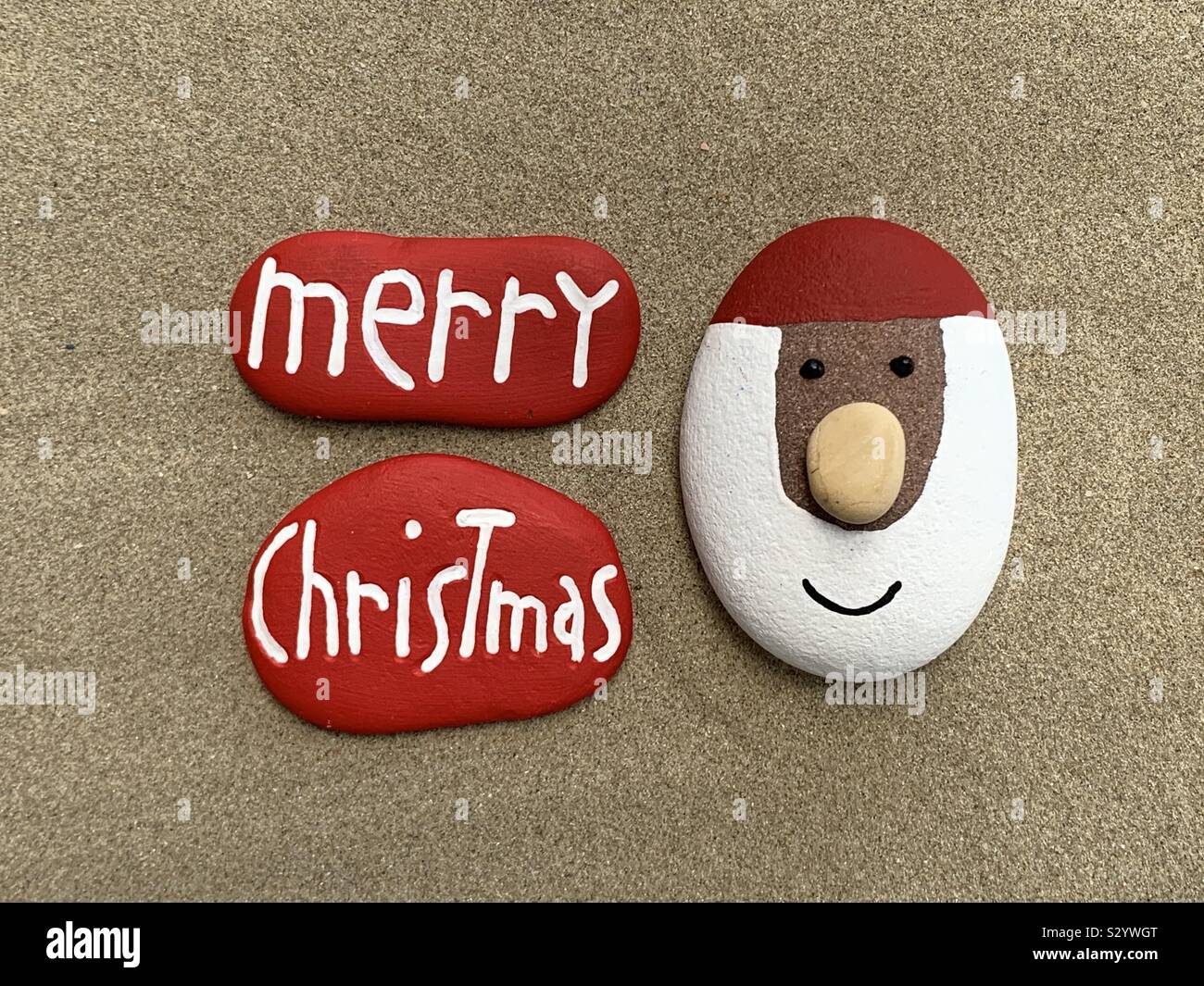Feliz Navidad mensaje con piedras design Foto de stock