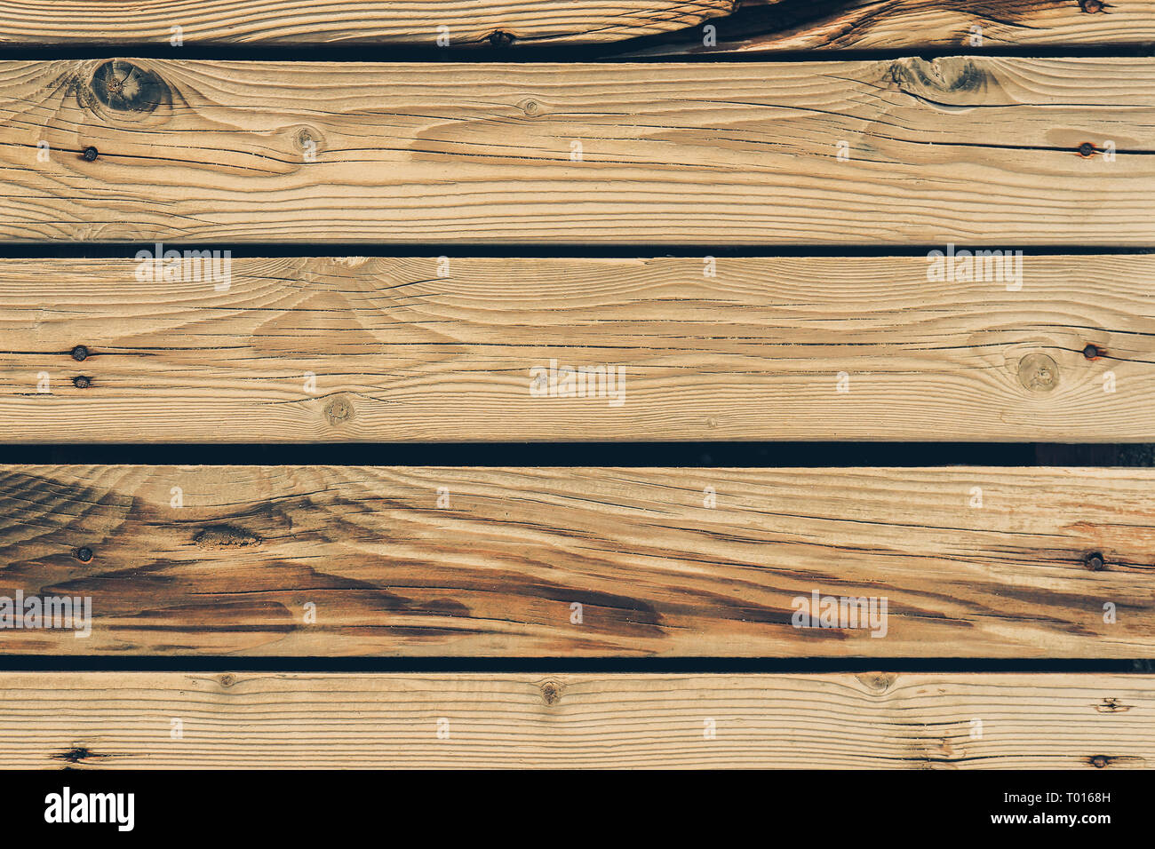 Playa de madera. Los tablones de madera con clavos de textura. Las