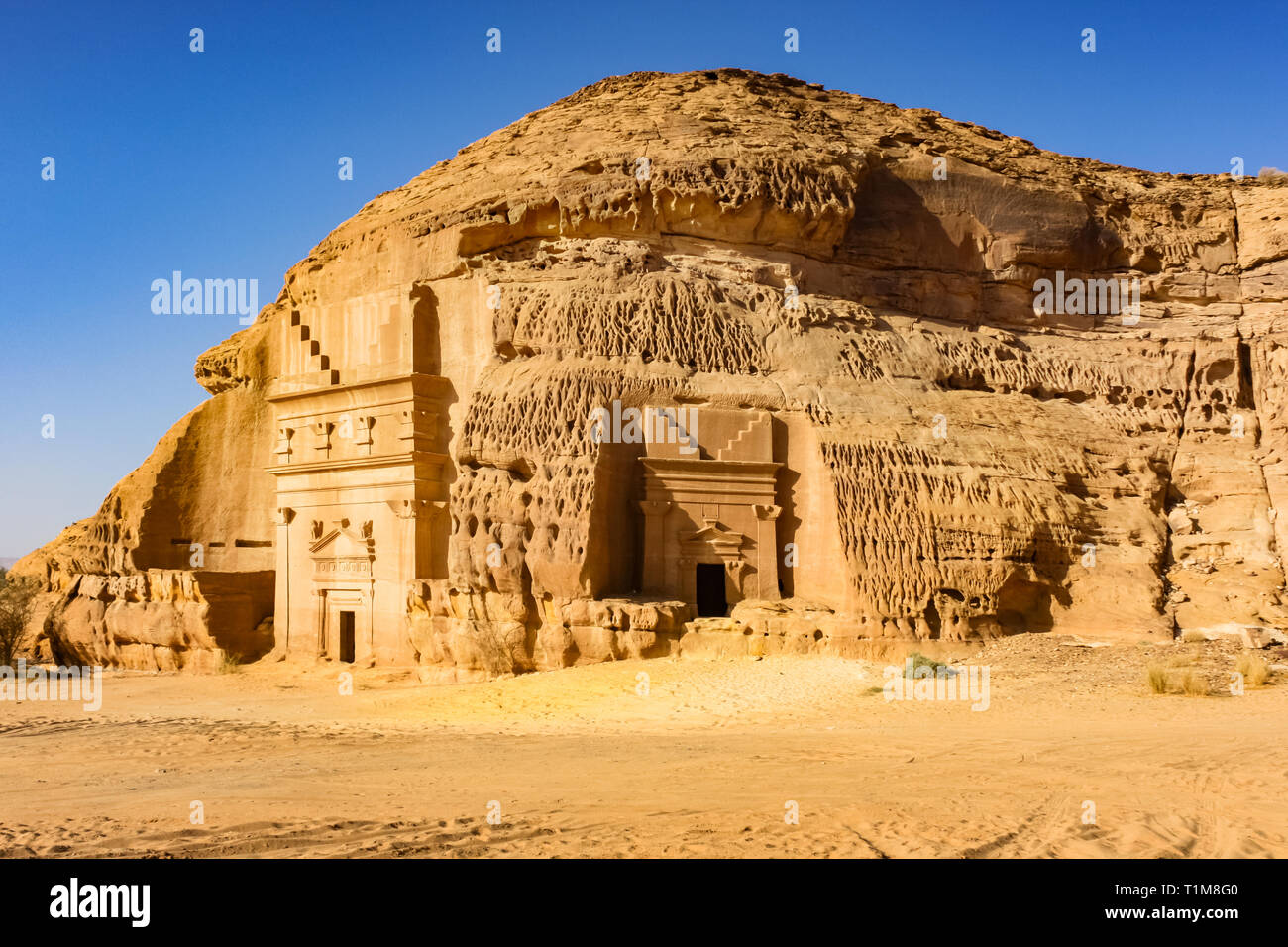 Rock-cut nabateo tumbas de Mada'en venta, un sitio del patrimonio mundial de la UNESCO en Arabia Saudita. Foto de stock