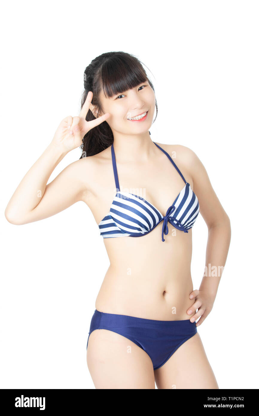 Hermosa mujer china vistiendo un bikini sexy aislado sobre un fondo blanco  Fotografía de stock - Alamy