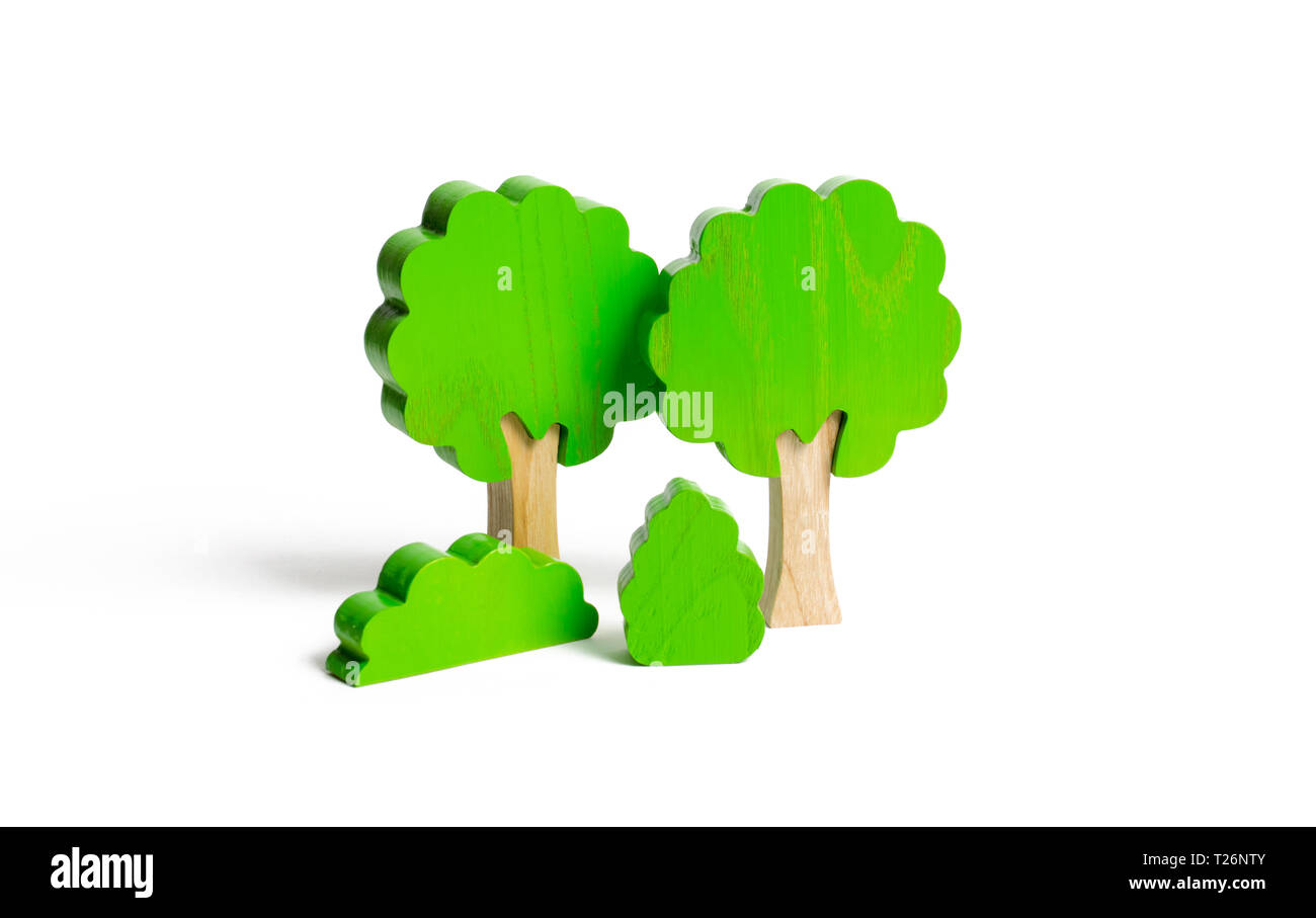 Figuras de madera de árboles y arbustos aislados en un segundo plano. El  concepto de los bosques y la naturaleza. Preservar el medio ambiente a  partir de la influencia humana. Ille Fotografía