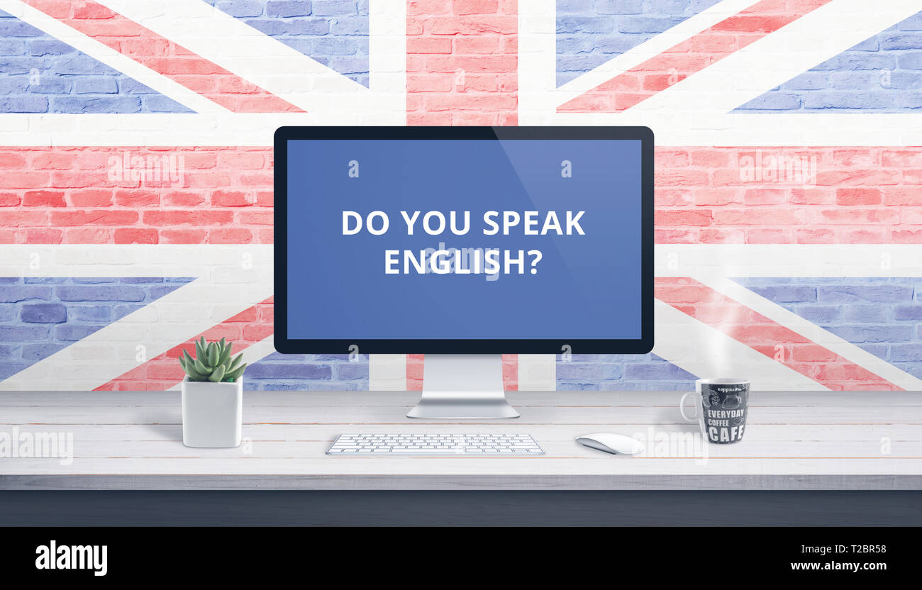 ¿Hablan inglés en pantalla de computadora con una bandera de Gran Bretaña en el fondo. Lecciones en línea concepto. Foto de stock