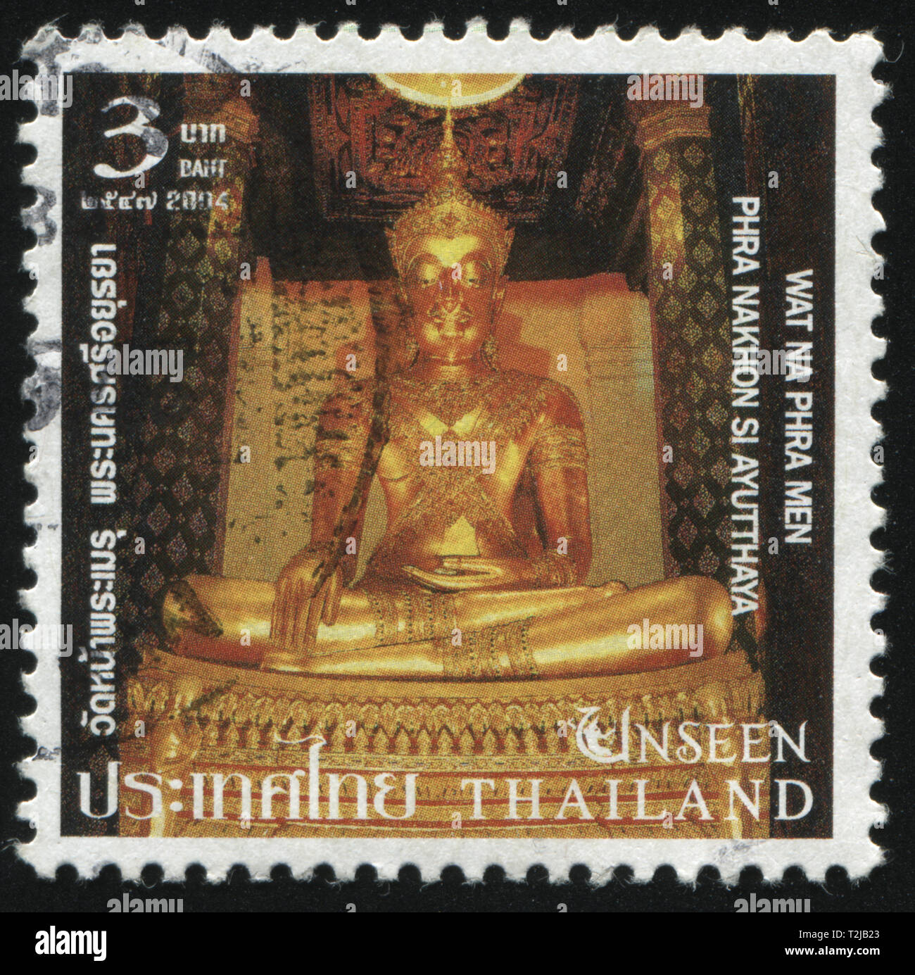 Rusia Kaliningrado, el 4 de junio de 2016: sello impreso por Tailandia, muestra una estatua de Buda de oro en el trono en el templo de Wat Phra Na Hombre, circa 2004 Foto de stock