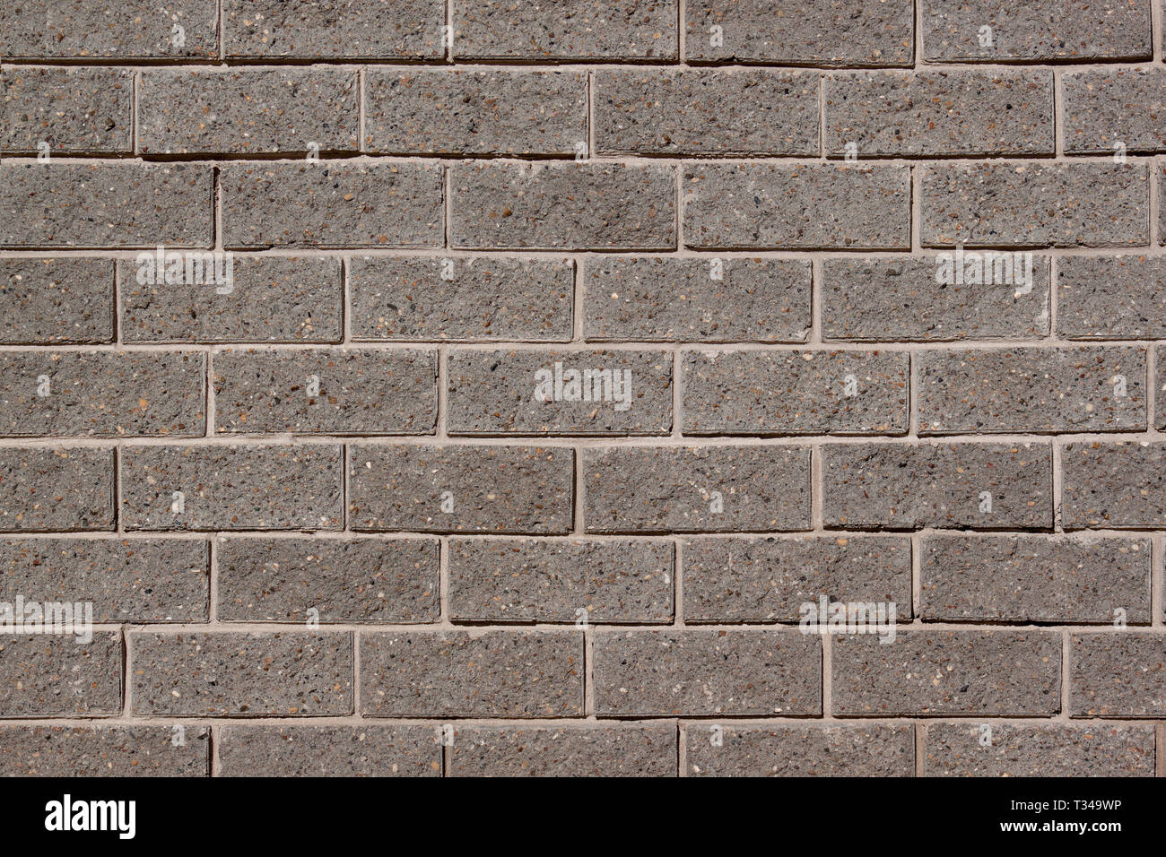 La Pared De La Casa Esta Revestida Con Ladrillos Grises Utilizado