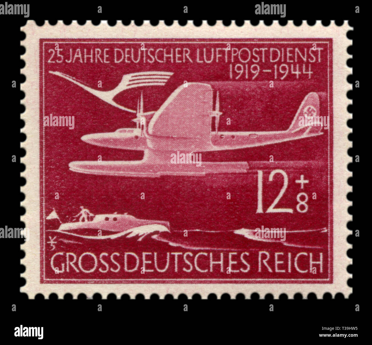 Sello histórico alemán: 25º aniversario del servicio aéreo postal alemán. Hidroavión Blohm & Voss HA 139a volar sobre el agua, el correo aéreo, de 1944, la Dra. Foto de stock