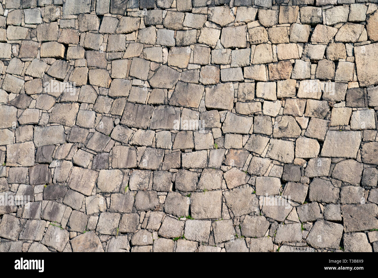 Muro de piedra para papel tapiz y antecedentes, desde el muro de piedra del  castillo Osaka, Japón Fotografía de stock - Alamy