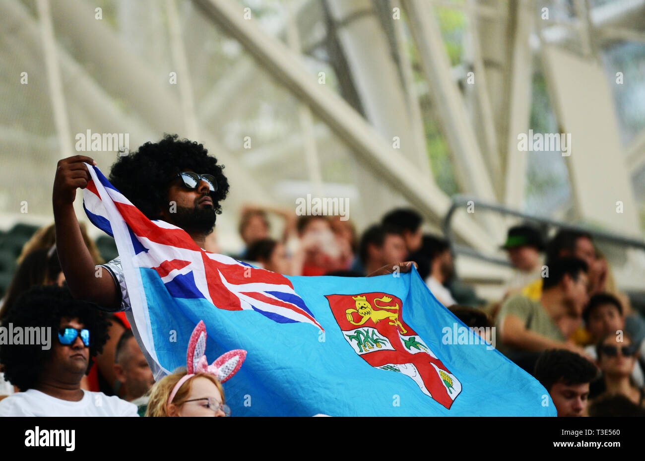 Ventiladores de Fiji asistir al torneo de Rugby Sevens de Hong Kong. Foto de stock