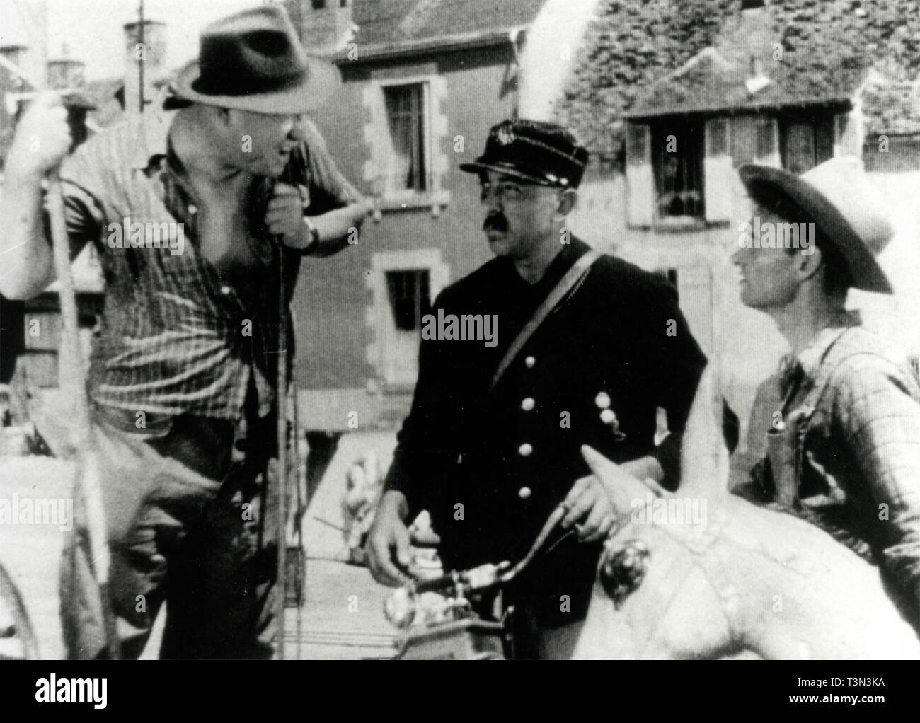 El actor francés Jacques Tati en la película Jour de fete, 1949 Foto de stock
