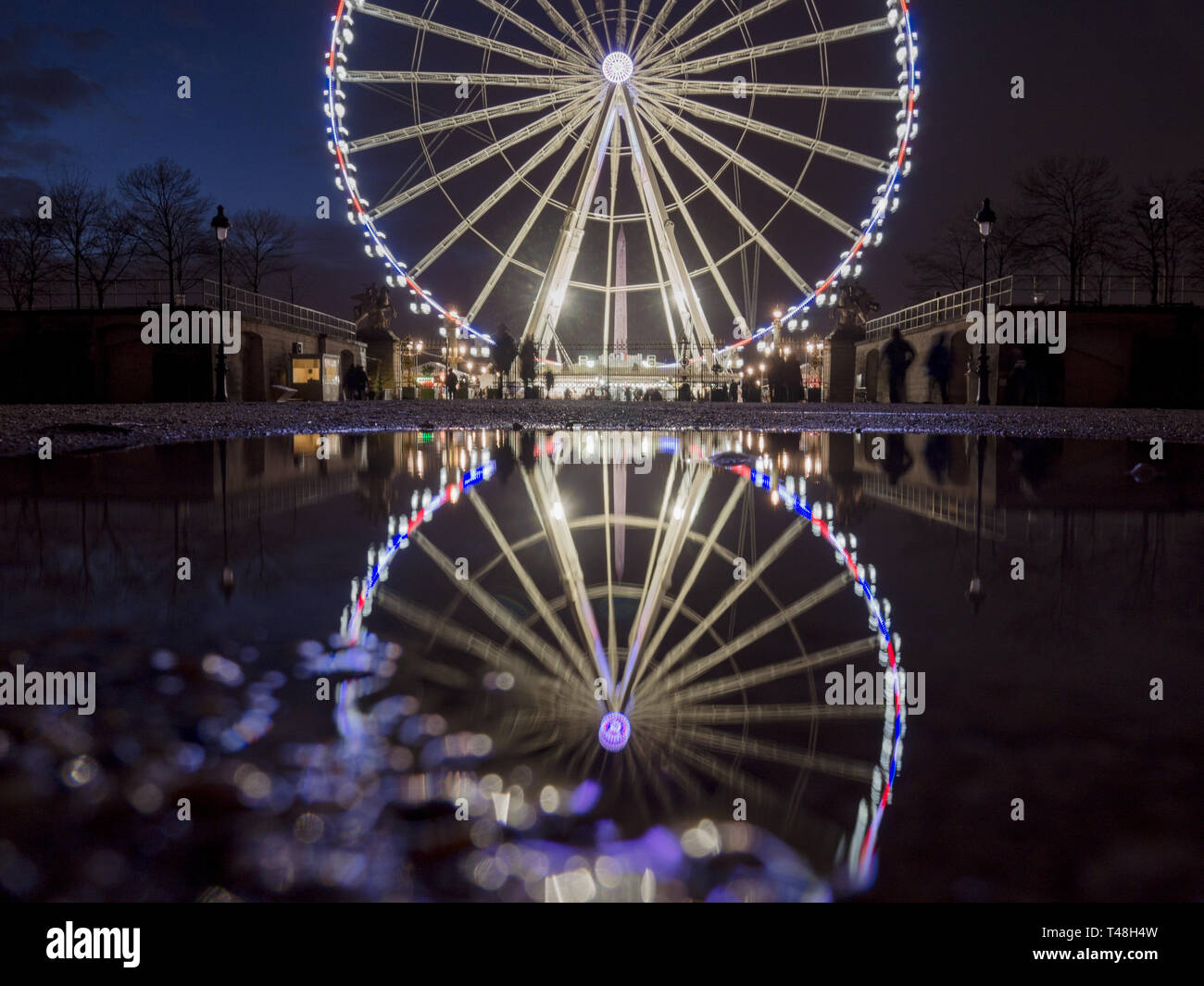 La Grande Roue de París, por la noche Foto de stock