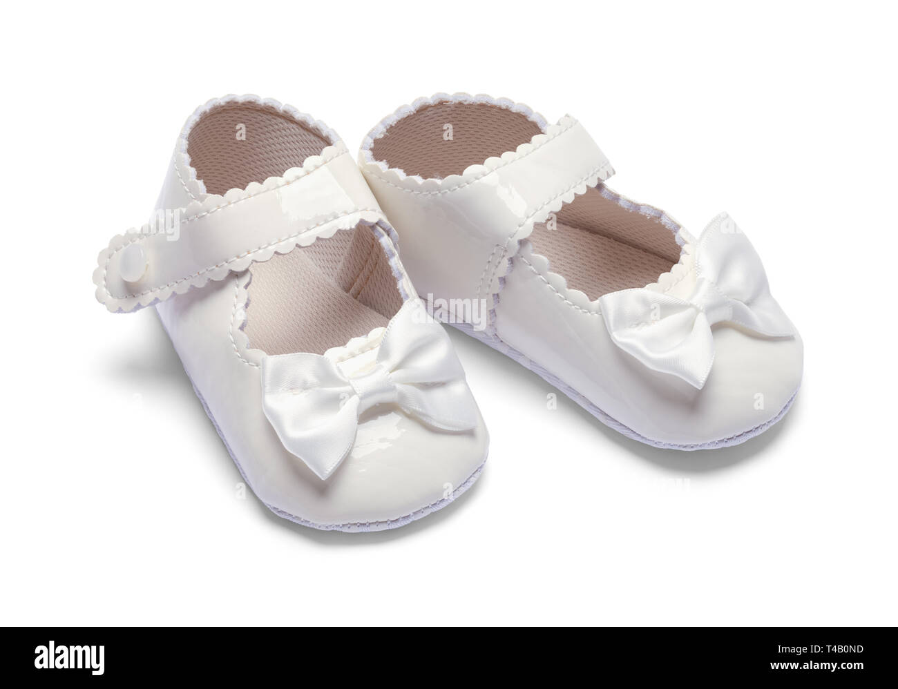 Dos niñas Baby Shoes aislado sobre fondo blanco. Foto de stock