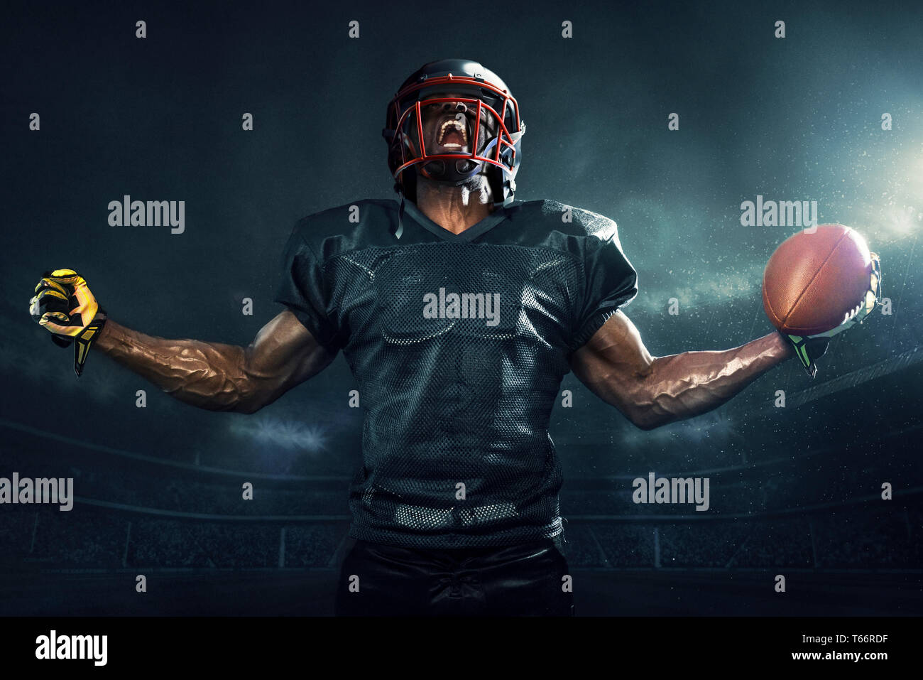 Jugador de fútbol muscular vítores Foto de stock