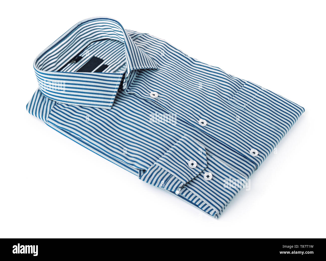 Plegada a rayas azules mens camisa de algodón aislado en blanco Foto de stock