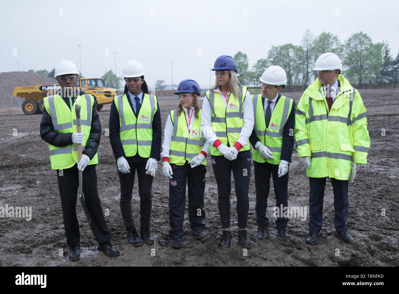 Atletas y dignatarios durante el ceremonial pionero de los juegos de la Commonwealth en 2022, en la Aldea de Atletas Perry Barr, Birmingham Foto de stock