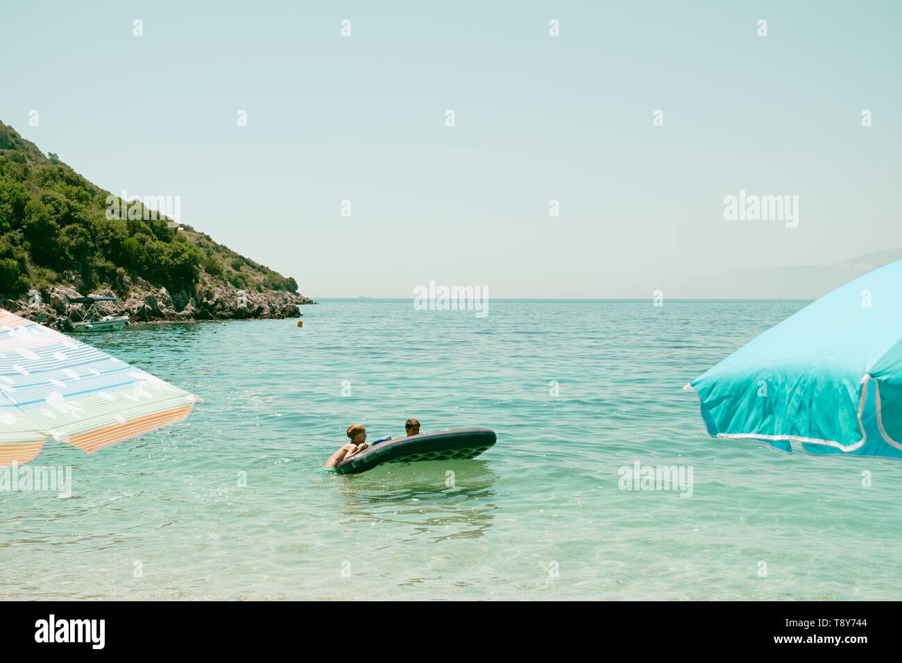 Having fun in inflatable in the sea fotografías e imágenes de alta  resolución - Alamy