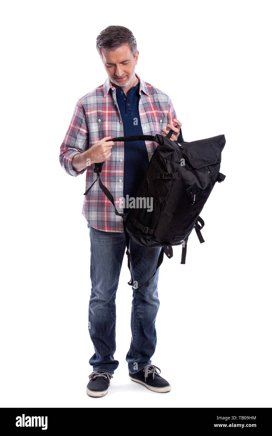 Hombre Middle-Aged Preparar una mochila de senderismo o trekking. También  podría ser un turista de embalaje llevar el equipaje de mano en preparación  para un viaje Fotografía de stock - Alamy