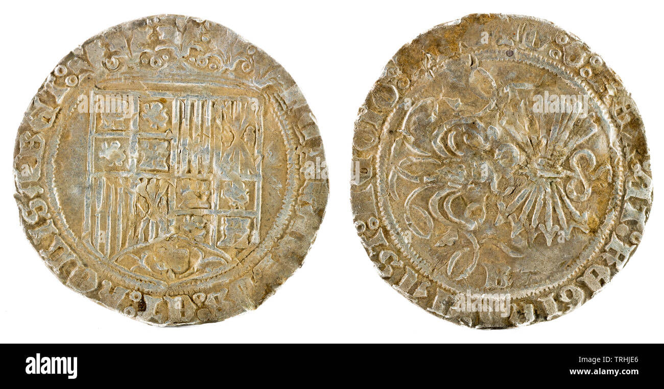 Antigua moneda de plata española de los reyes Fernando e Isabel. Reyes Católicos. Acuñado en Burgos. Real. Foto de stock
