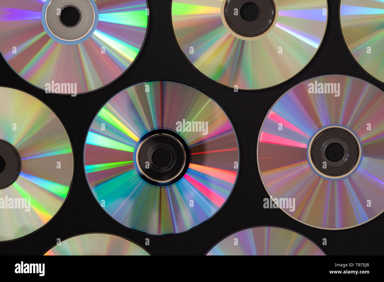 Vintage de fondo de disco CD o DVD, antiguo círculo discos utilizados para  el almacenamiento de datos, compartir películas y música Fotografía de  stock - Alamy