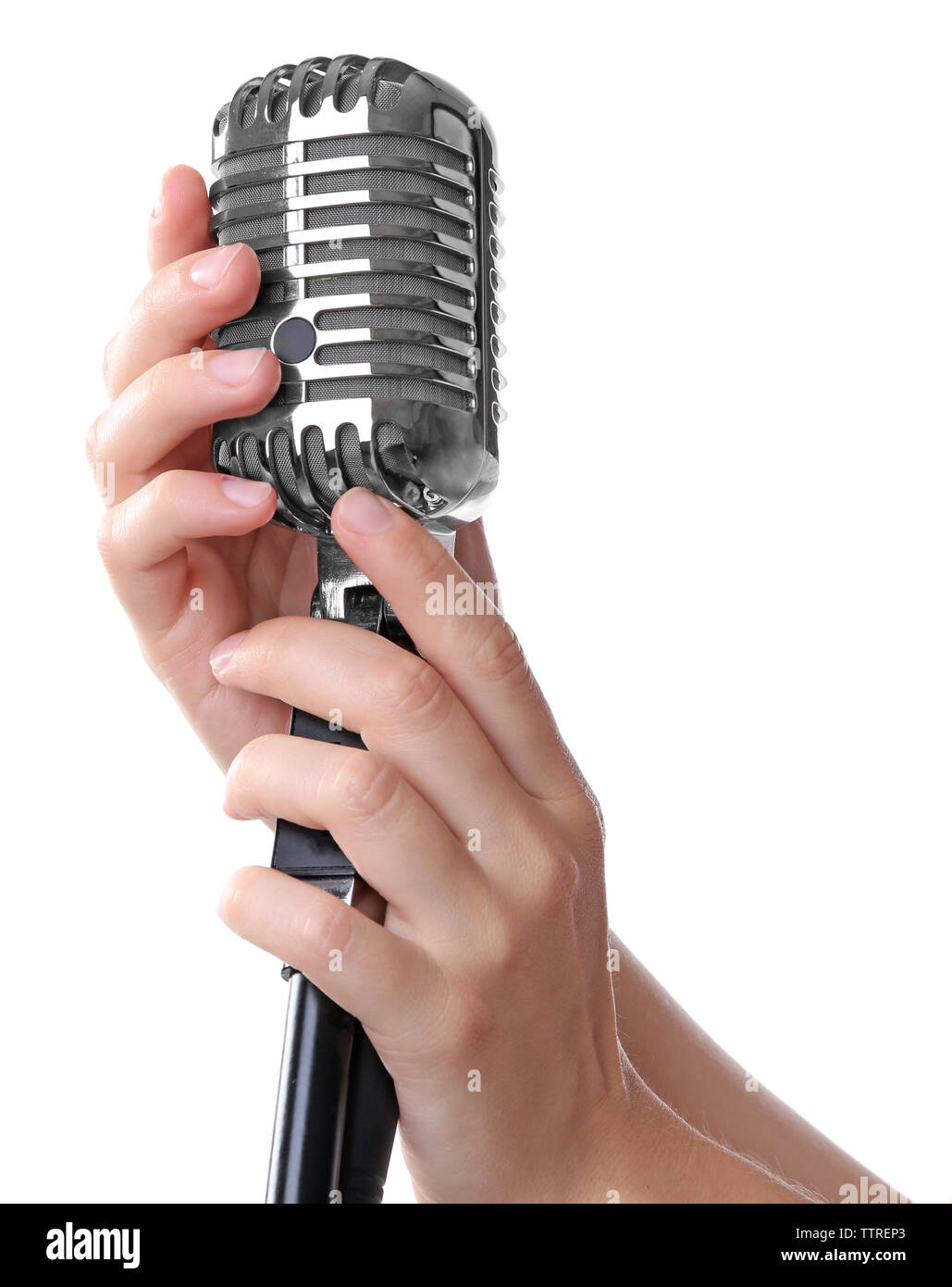 Manos femeninas con micrófono vintage sobre fondo blanco Fotografía de  stock - Alamy