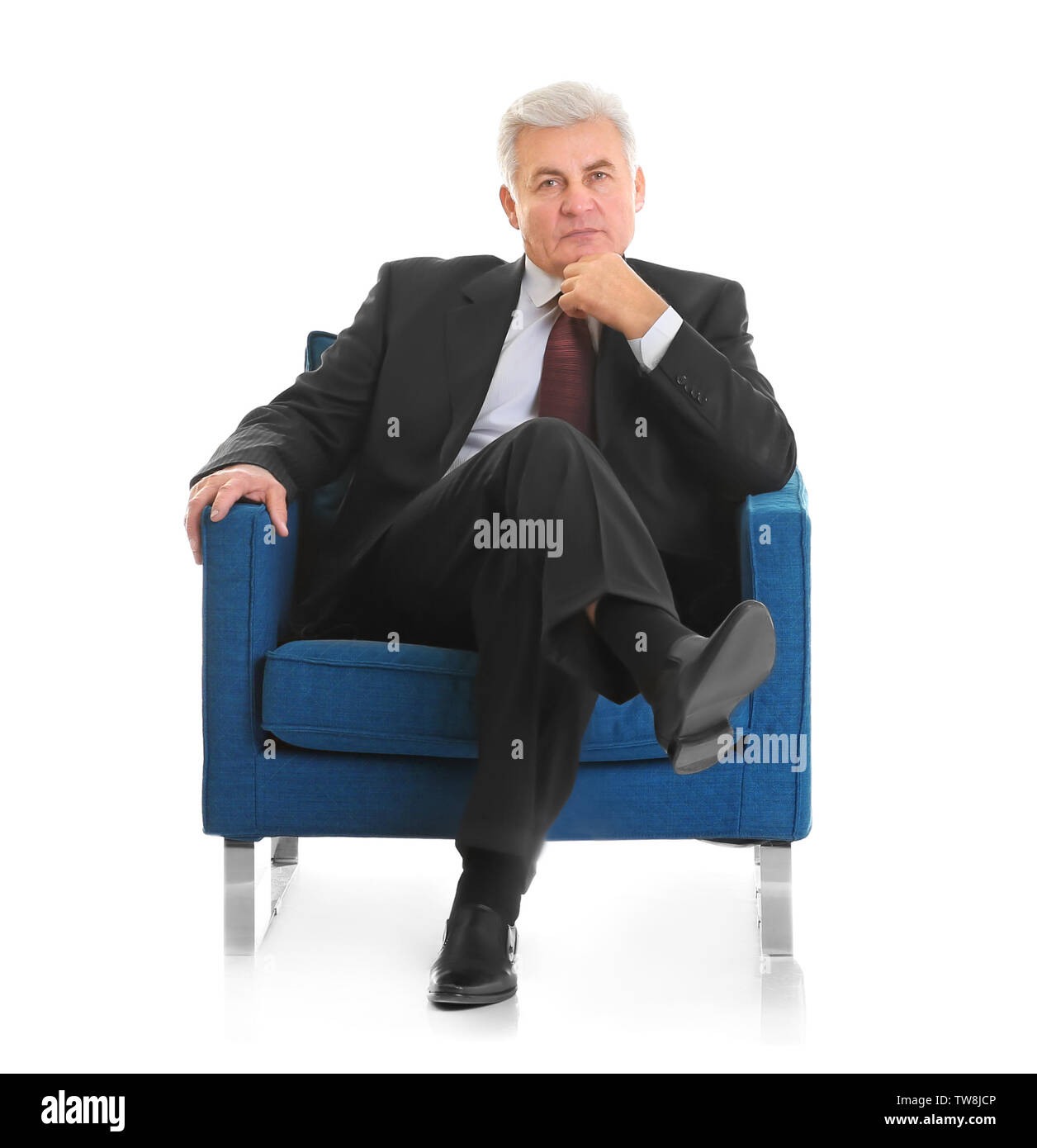 Hombre sentado en el sillón Imágenes recortadas de stock - Alamy