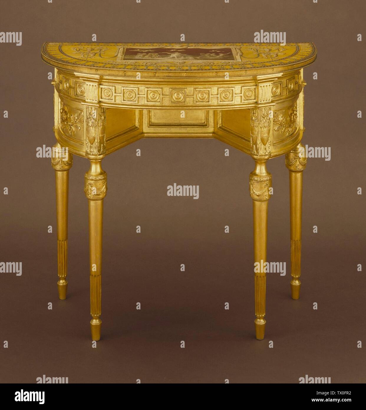 Buckingham House Side Table; Inglaterra; Italia, mobiliario de alrededor de 1780; muebles Madera, dorado, pintura, ormolu, latón, montajes de bronce con dorado de 33 x 35 5/16 x 17 9/16 pulgadas. (83.82 x 89.69 x 44.61 cm) Fondo del Consejo de Artes Decorativas y Fondo de adquisición de Museos (M.83.38) Artes Decorativas y Diseño Actualmente en vista pública: Edificio Ahmanson, piso 3; fecha circa 1780 QS:P571,+1780-00-00T00:00:00Z/9,P1480,Q5727902; Foto de stock